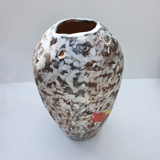 Black vase with white overlay